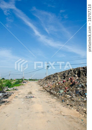 Gravel road full of garbage. Gravel road full of garbage. 18707118