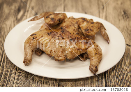 Fried chicken tapaka on porcelain plate 18708028