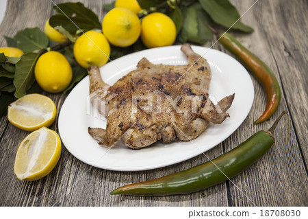Fried chicken tapaka on porcelain plate  18708030