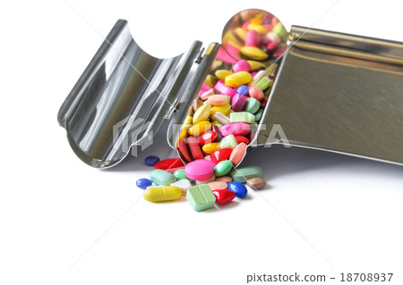 Colorful medicine on the drug counting tray 18708937