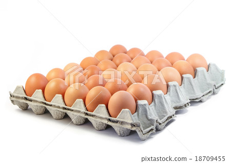 Fresh eggs in paper tray on white background 18709455