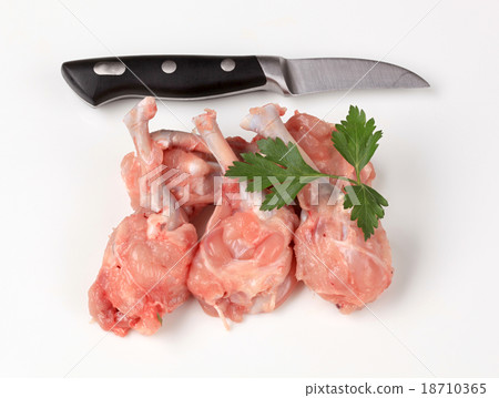 Raw skinless chicken drumsticks 18710365
