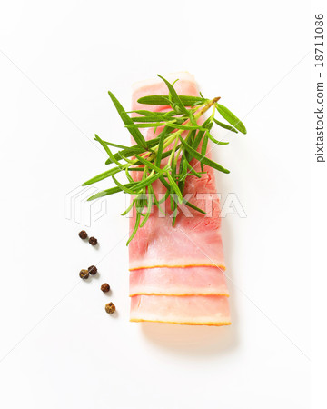 Thin slices of cooked ham, rolled up 18711086