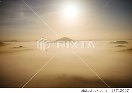 Fairy misty night. Hills like islands  in fog. 18712097