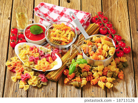 Assortment of colored pasta 18713126