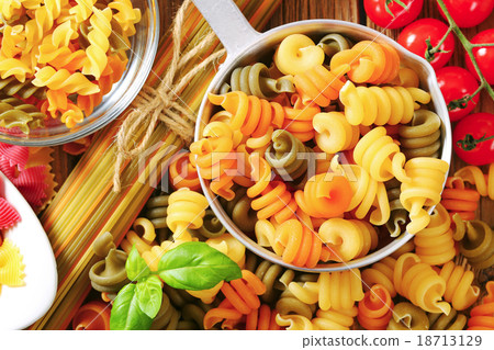 Assortment of colored pasta 18713129