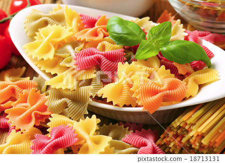 Colored bow tie pasta Colored bow tie pasta 18713131