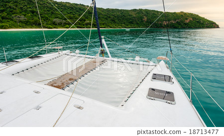 Empty catamaran yacht deck sailing on the sea 18713477