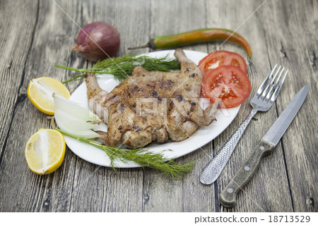 Fried chicken tapaka on porcelain plate Fried chicken tapaka on porcelain plate 18713529
