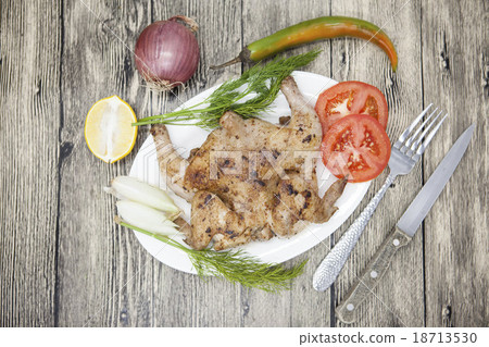 Fried chicken tapaka on porcelain plate 18713530