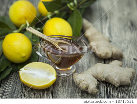 The composition of glass vase with floral honey The composition of glass vase with floral honey 18713531