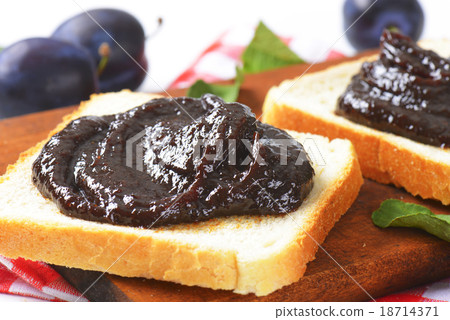 White bread with plum jam White bread with plum jam 18714371