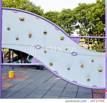 climbing a wall with slider 18717794