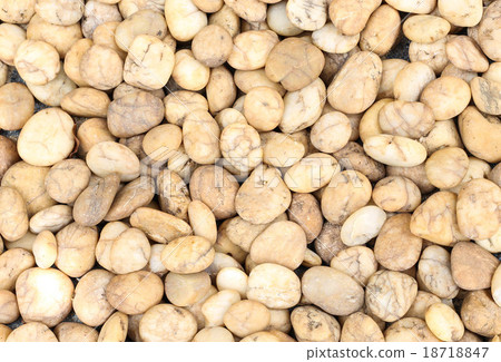 Small brown natural garden rock pebbles background 18718847