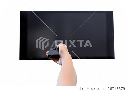 Hand holding remote control to the TV screen Hand holding remote control to the TV screen 18718879