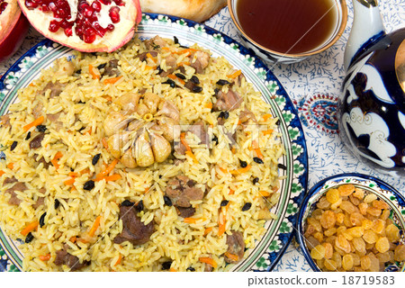 Pilaf - Eastern food - rice, oil, meat and spices Pilaf - Eastern food - rice, oil, meat and spices 18719583