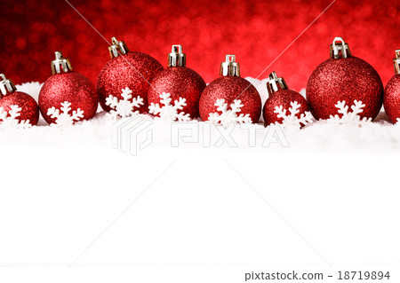 many christmas balls in the snow 18719894