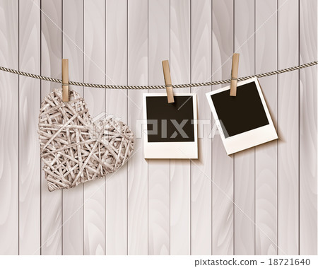 Wooden heart with photographs on rope. Vector. 18721640