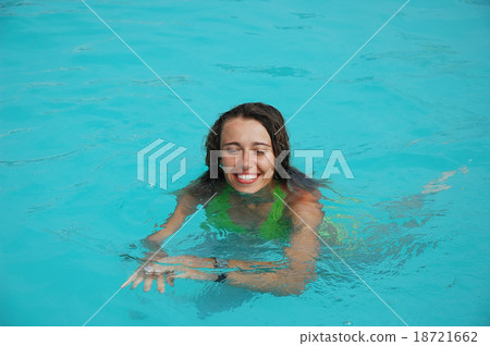 happy woman bathes in pool happy woman bathes in pool 18721662