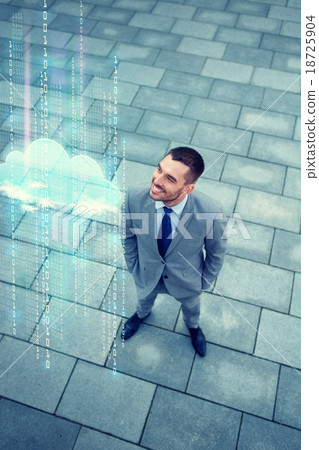 young smiling businessman outdoors from top young smiling businessman outdoors from top 18725904