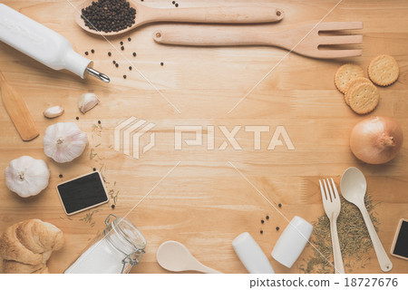 kitchen utensils on wooden table from above 18727676