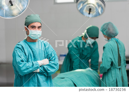 Surgical team in operating theater 18730236