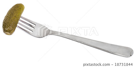 dinning fork with impaled pickled cucumber 18731844