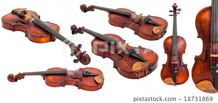 set of old violins isolated on white set of old violins isolated on white 18731869
