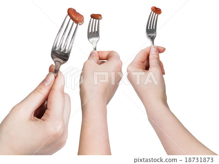 set of dinning forks with impaled brown bean 18731873