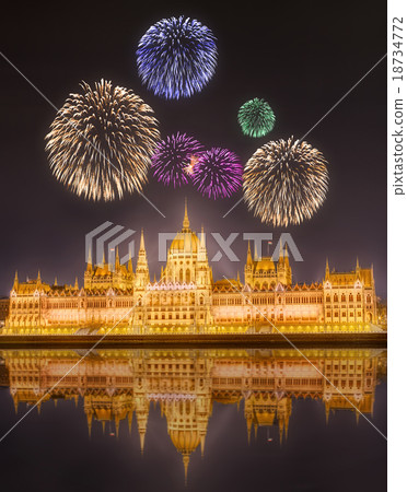 Beautiful fireworks under hungarian Parliament Beautiful fireworks under hungarian Parliament 18734772