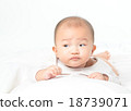 Asian baby lying on stomach 18739071