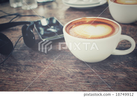 Smart phone with earphone and coffee cup Smart phone with earphone and coffee cup 18749912