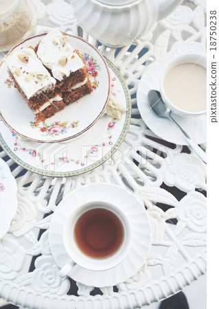 Carrot cake with hot tea Carrot cake with hot tea 18750238
