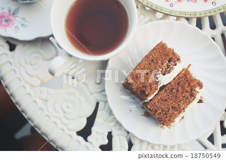 Carrot cake with hot tea Carrot cake with hot tea 18750549
