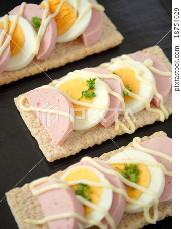 Sausage canapé (vertical position high angle) Sausage canapé (vertical position high angle) 18754029