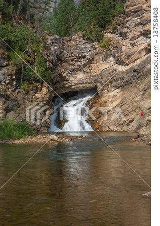 Waterfall in Glacier National Park 18758408