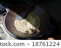 Bali fresh coffee bean being roasted on the pan 18761224