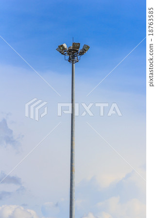 Spotlight pole blue sky cloud 18763585