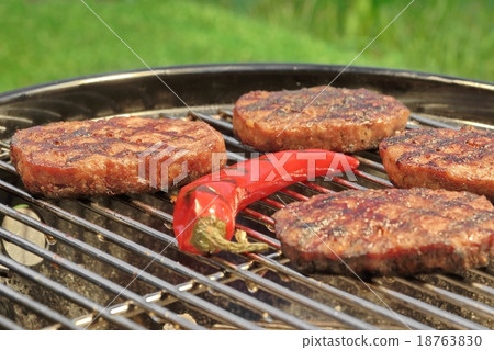 BBQ Hamburger And Chili Pepper On The Hot Grill BBQ Hamburger And Chili Pepper On The Hot Grill 18763830