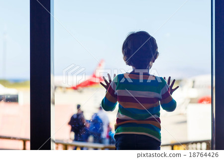 little tired kid boy at the airport, traveling little tired kid boy at the airport, traveling 18764426