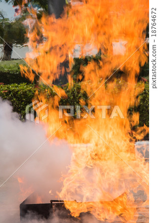 Flame in container on fire fighting training 18764672