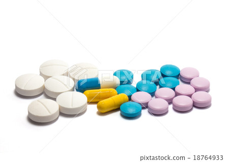 Diferent tablets pills mix on white background 18764933