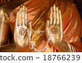 Hands of Buddha with Jasmine flowers 18766239