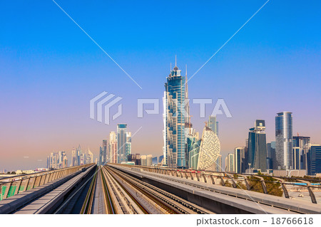 Dubai's Metro with skyscrapers 18766618
