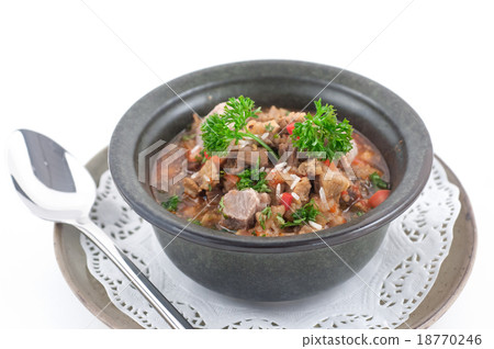 Beef stew with celery in a stone bowl 18770246