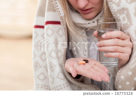 Pretty ill woman is suffering from flue Pretty ill woman is suffering from flue 18773328