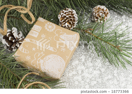 Christmas present and fir tree on shiny background Christmas present and fir tree on shiny background 18773366