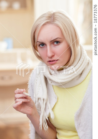 Cute young lady has caught a cold Cute young lady has caught a cold 18773376
