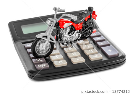 Calculator and toy motorbike 18774213