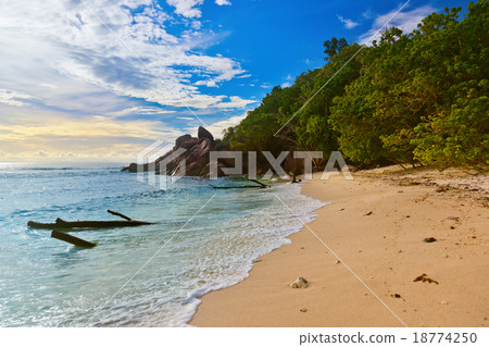 Seychelles tropical beach at sunset 18774250